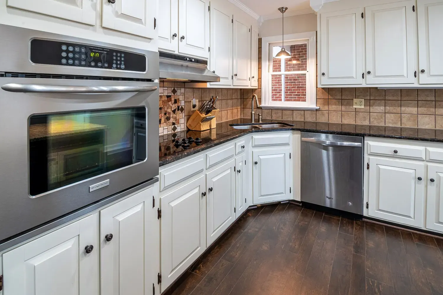 Cabinet painting in Marietta, GA: white kitchen cabinets with a smooth painted finish