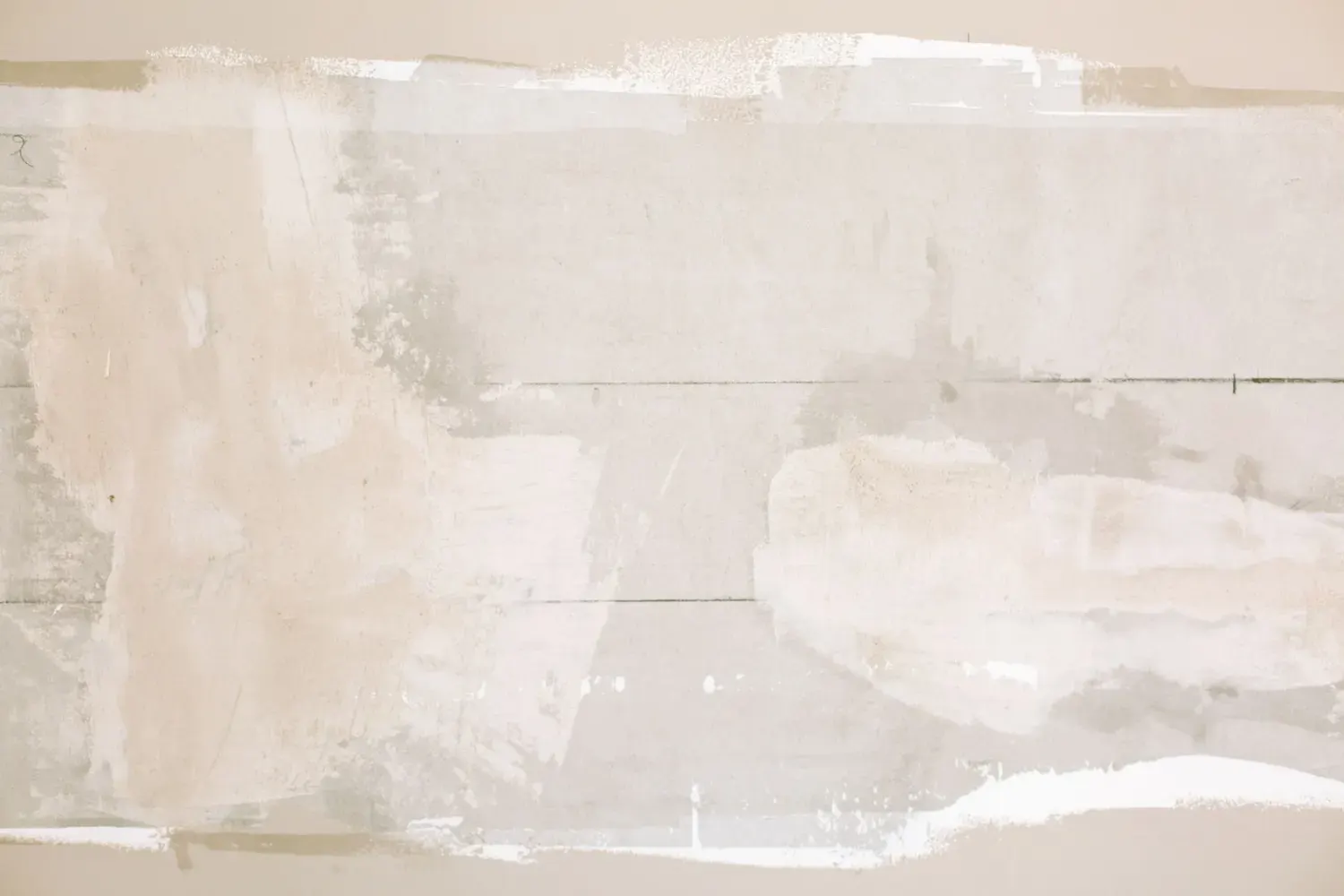 Drywall repair in Marietta, GA: patched and skim-coated wall section before painting