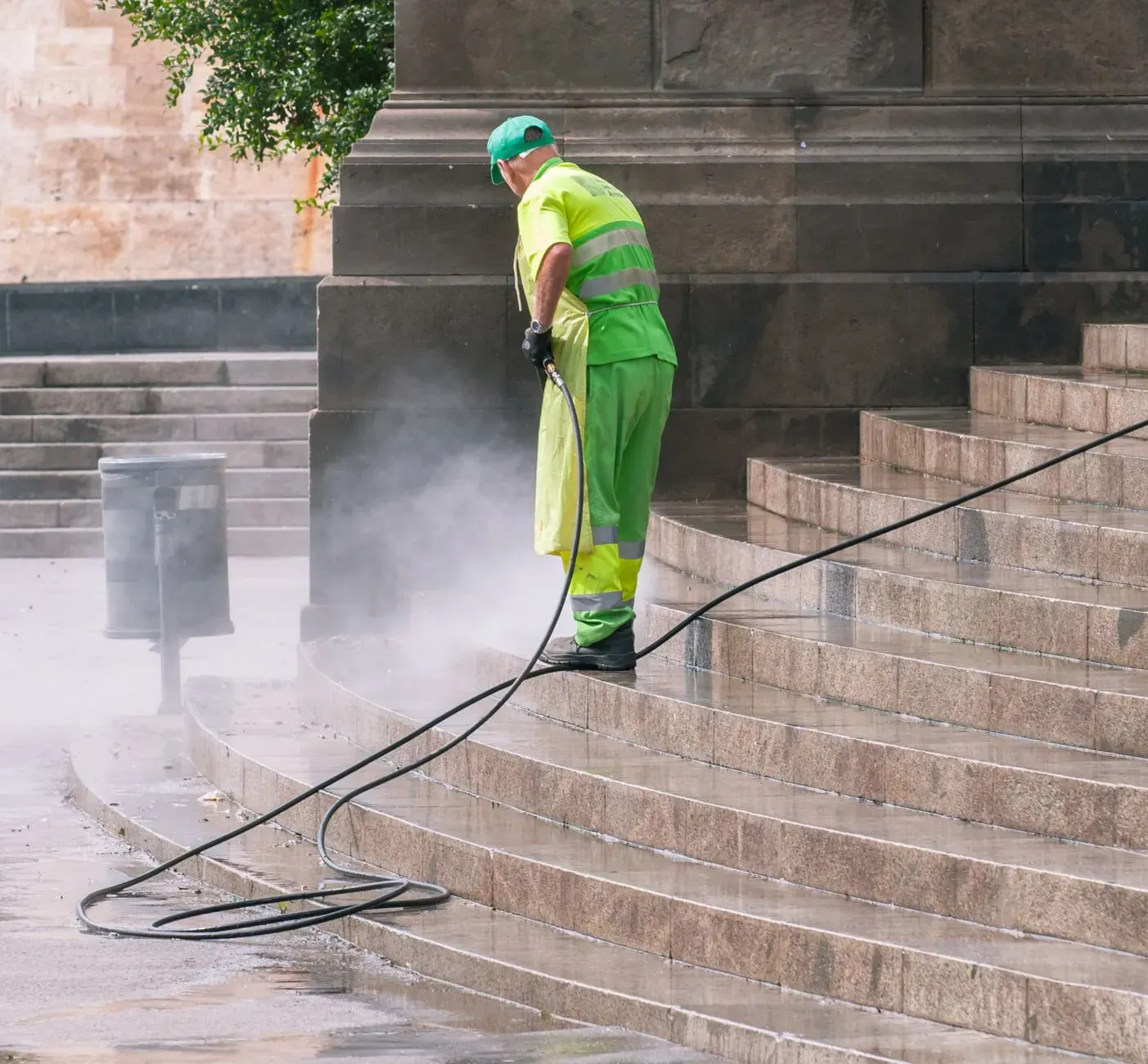 Pressure washing in Marietta, GA: worker pressure washing stone steps